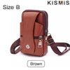 Brown vintage leather waist bag with a belt clip for phone and essentials