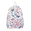 A light-colored backpack featuring a colorful butterfly pattern.
