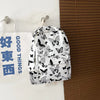 White backpack featuring a black butterfly pattern, hanging against a light background.