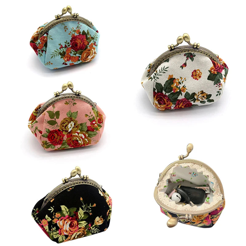 A collection of four vintage rose print canvas coin purses in various floral patterns and colors.