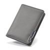A gray slim faux leather business card wallet shown from above.