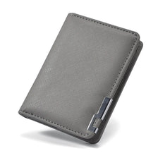 Graues schlankes Kunstleder-Visitenkarten-Wallet von oben.