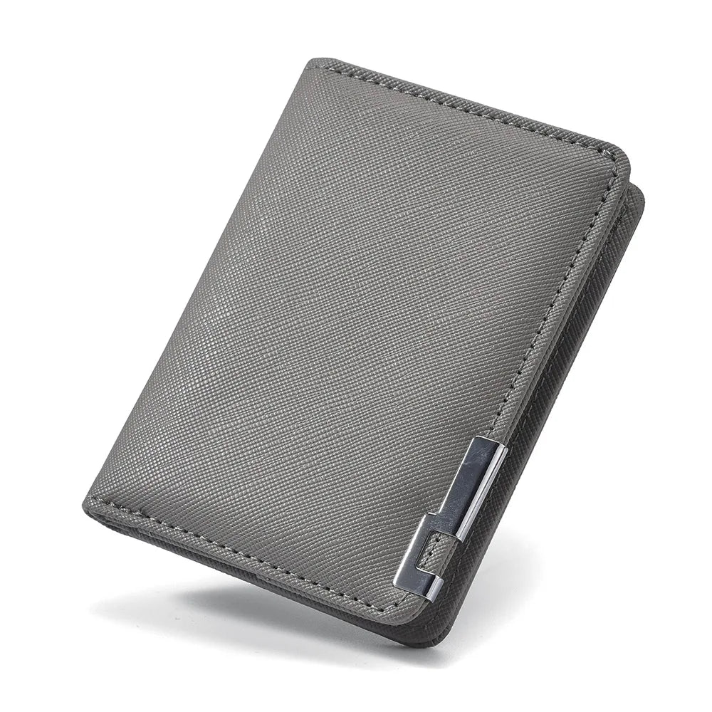A gray slim faux leather business card wallet shown from above.