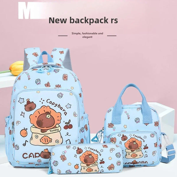 A set of light blue cartoon animal backpacks featuring cute orange bears and various colorful icons.