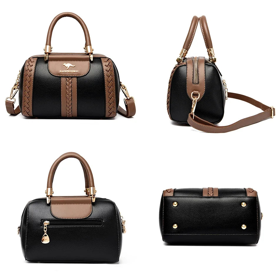 A luxury women's leather shoulder crossbody bag in black and tan leather.