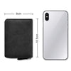 Black compact card wallet with 11 slots shown next to a smartphone for scale.