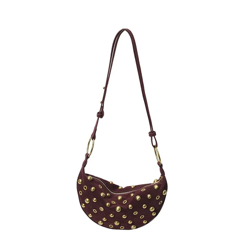 A brown faux suede hobo crossbody bag with gold rivet accents shown against a white background.