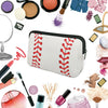 A white cosmetic organizer bag with red embroidery, surrounded by various makeup products and tools.