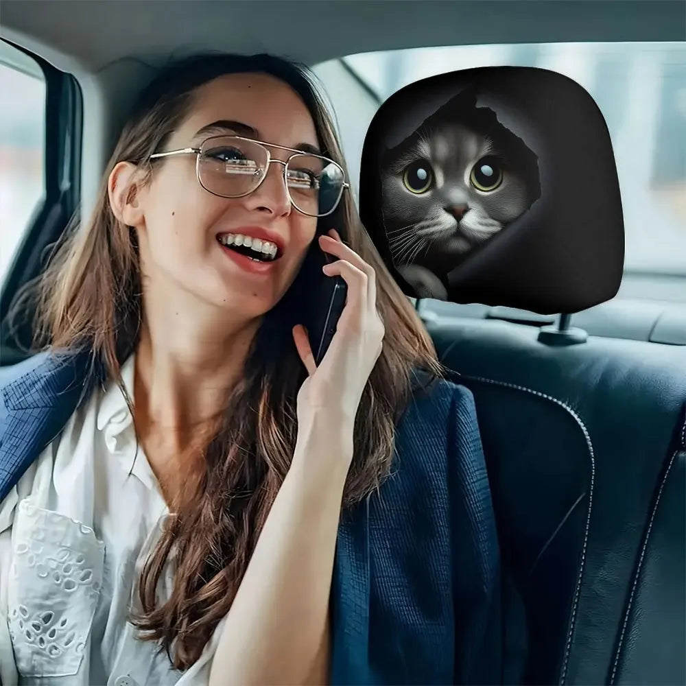 A woman smiling while using a car headrest cover featuring a cute cat design.