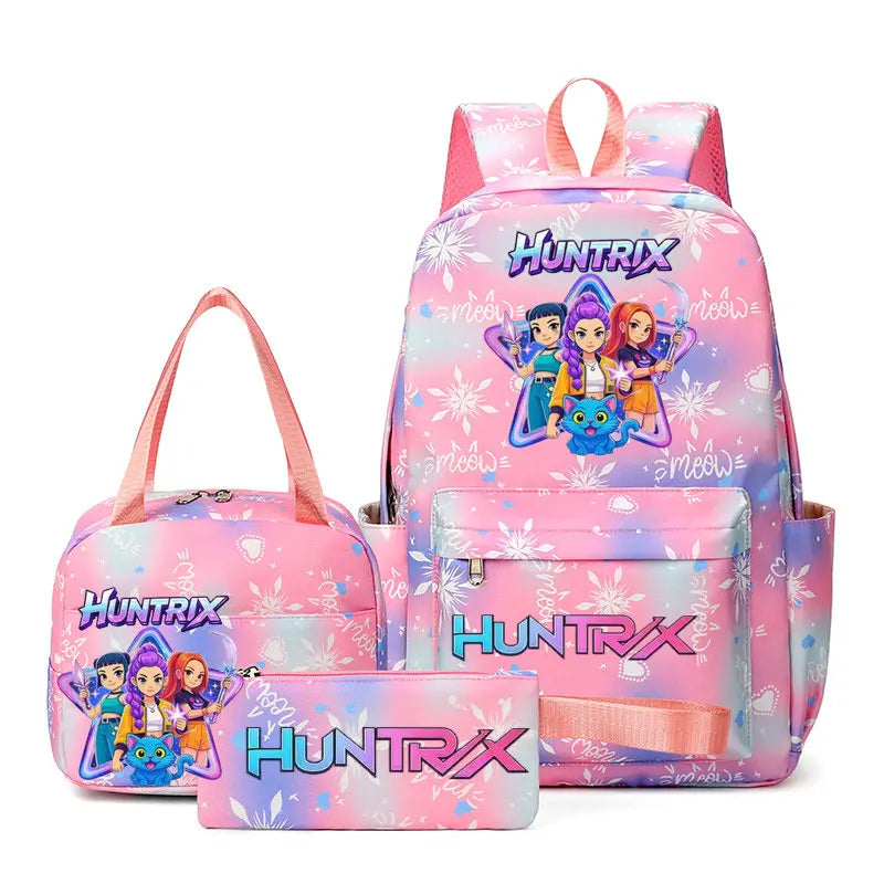 A pink and purple multi-compartment backpack set featuring the Huntrix theme with a large backpack and separate pouches.