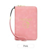 A pink passport holder wallet with a gold clasp and wrist strap.