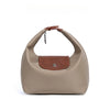 A beige nylon dumpling crossbody shoulder bag with a brown leather strap and flap.