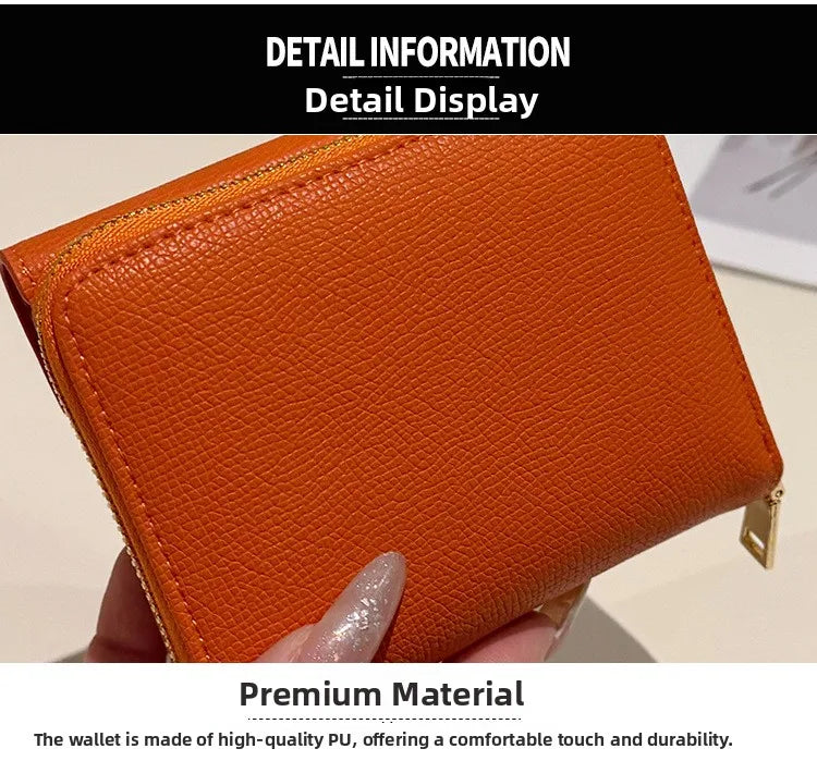 Orange leather card holder displayed in detail showing its texture and premium material quality