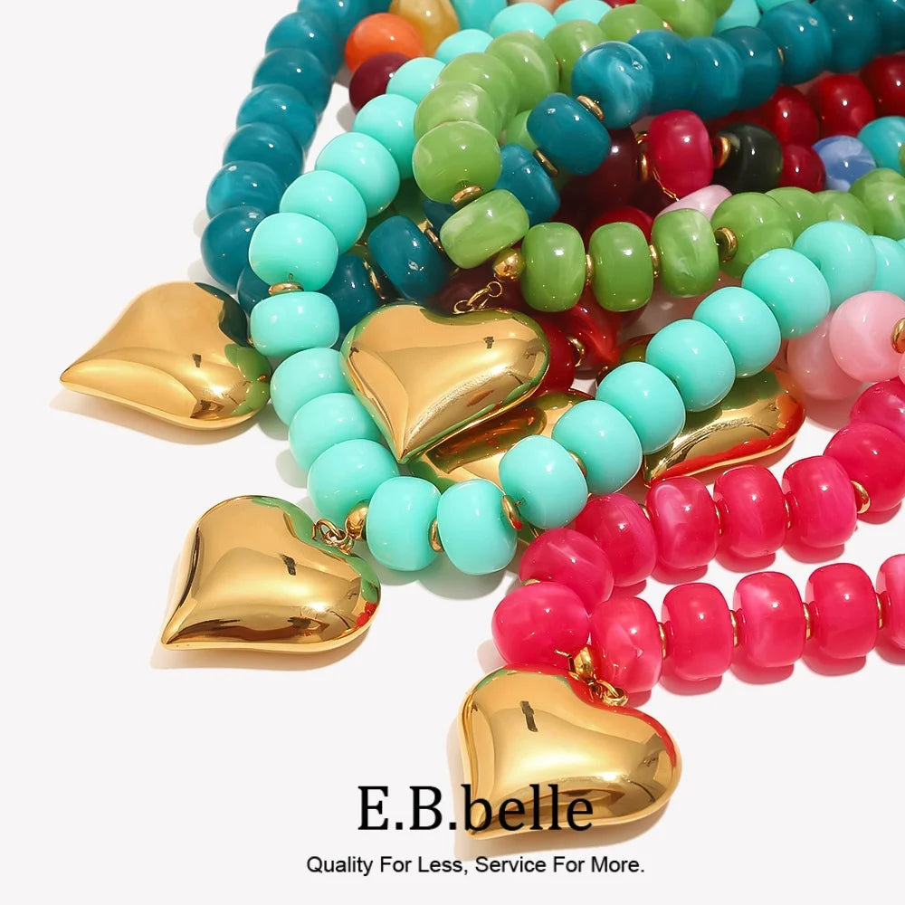 A vibrant necklace featuring multicolored heart-shaped beads in shades of blue, green, pink, and red.