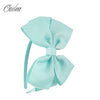 A light mint green striped bow headband product.