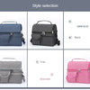 A selection of reusable insulated lunch bags in dark blue, black, gray, and rose red.