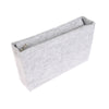 A light gray felt cosmetic bag insert organizer with a zippered opening.