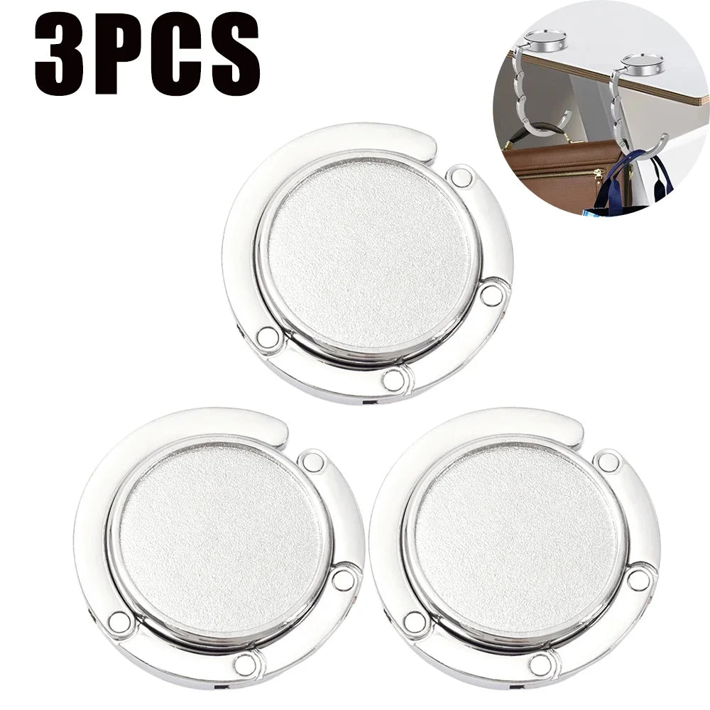 Tres ganchos de silicona plegables transparentes para organizar mesas y bolsos