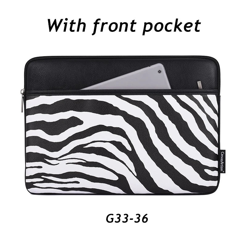 Black and white zebra print laptop sleeve with a front pocket