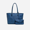 A navy blue geometric print tote bag set featuring a large tote and a smaller pouch.