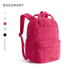 A bright pink Bagsmart backpack with a laptop compartment and multiple pockets.
