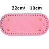 Pinkes, langlebiges PU-Beutel mit Bodennieten, 22 cm x 10 cm.
