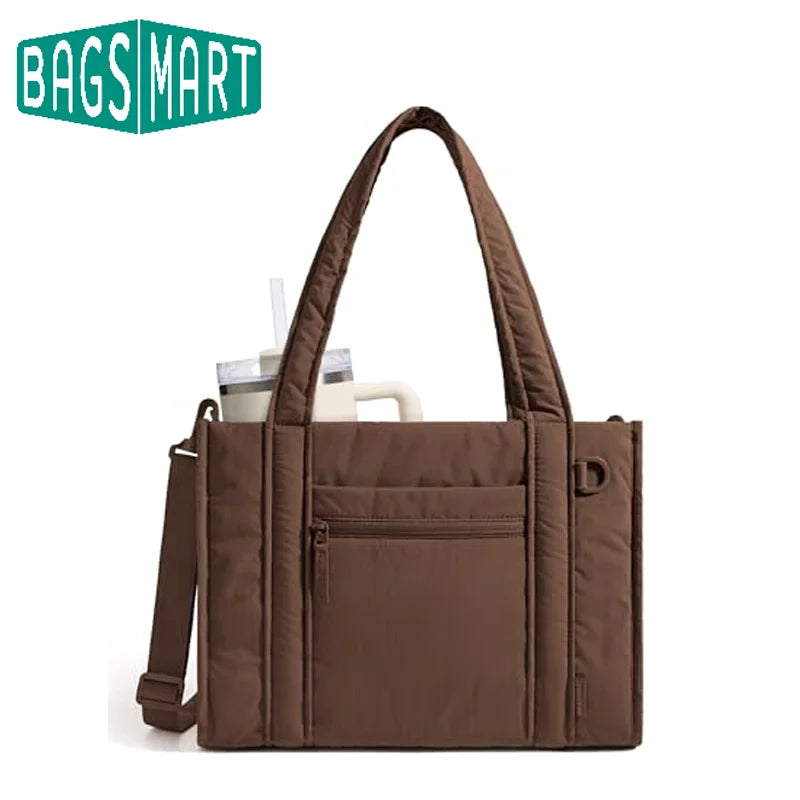 A brown quilted tote bag with a detachable strap is shown against a white background.