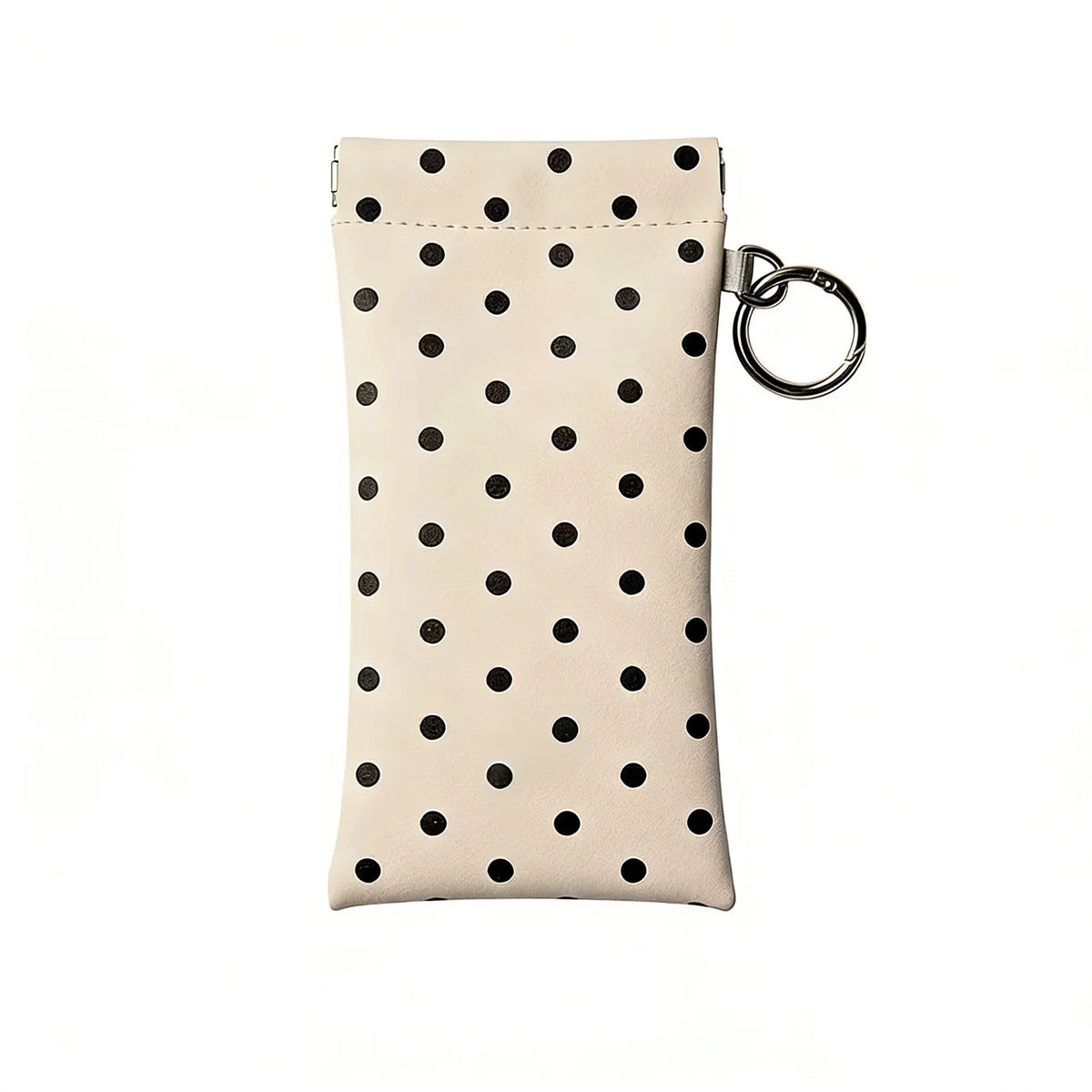 A beige polka dot eyeglass pouch with a silver keychain attached.
