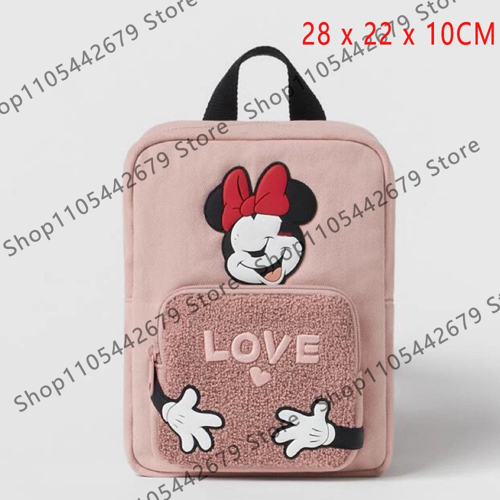 Mochila de peluche rosa con ratón pato caricatura y diseño de amor y gestos de la mano.