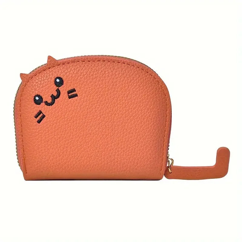 An orange faux leather multi-card wallet shaped like a cartoon cat face.