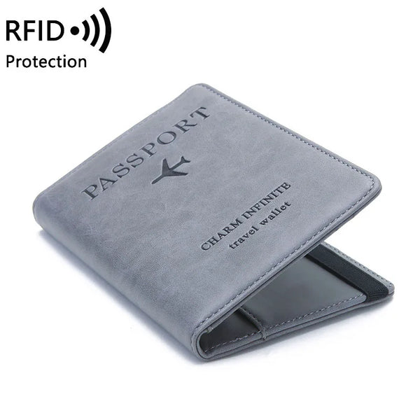 A gray premium PU leather passport wallet with a silhouette design and a flap open.