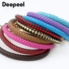 A stack of colorful PU leather replacement bag straps with metal buckles in various shades including pink, purple, blue, and 