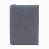A grey unisex PU leather passport holder with a slim design.