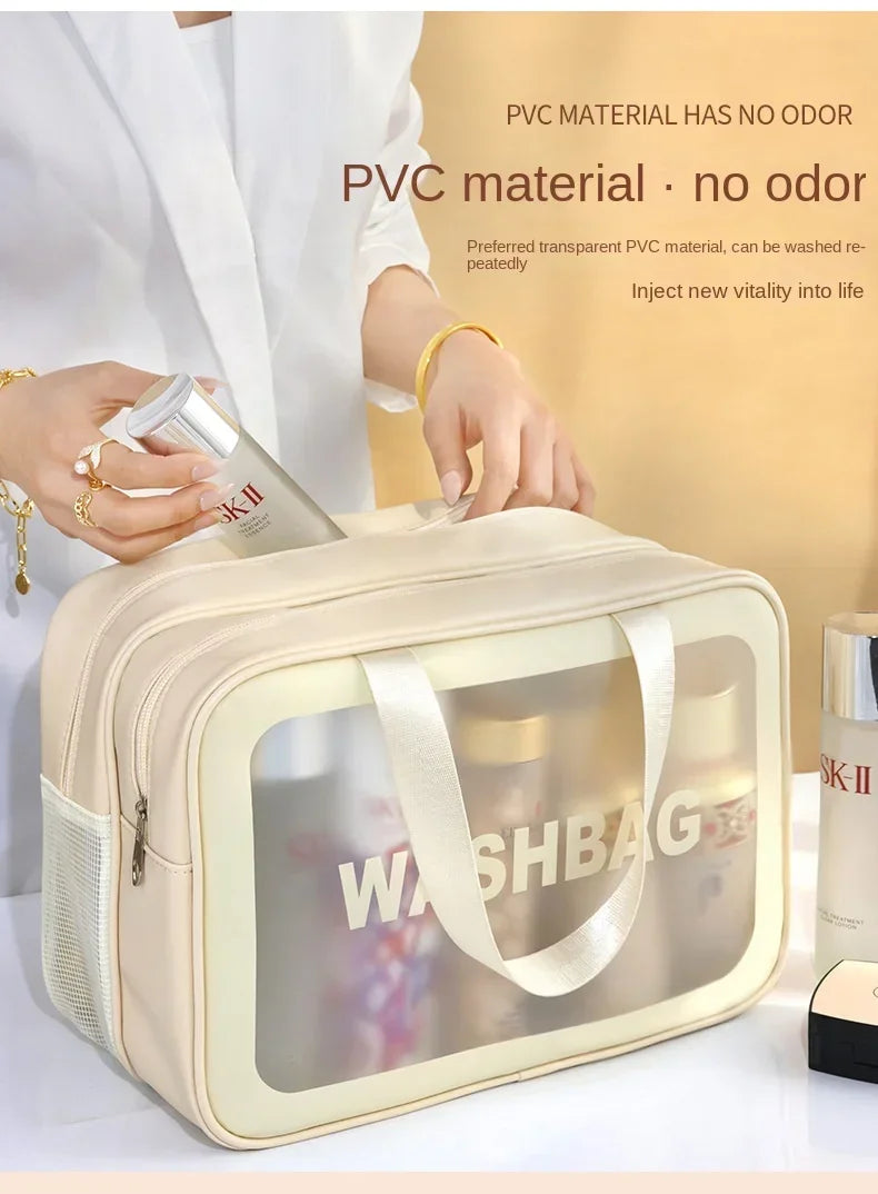 A beige PVC washbag with a clear window is shown next to a person holding a bottle.