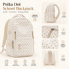 A cream-colored polka dot school backpack shown from the front, highlighting its features like pockets and durable straps.