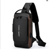 A black anti-theft crossbody chest bag with a brown accent and adjustable strap.