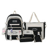 A set of five black and white nylon backpacks for students featuring a lucky sunday cartoon design.