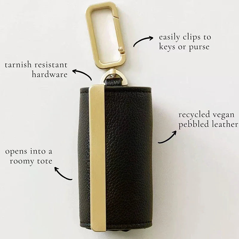 A black pebbled leather storage pouch with a gold-toned clip and hardware.
