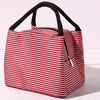 A red and white striped insulated lunch tote bag with a black adjustable shoulder strap.