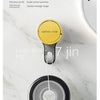 A yellow suction hook is shown attached to a black circular base, demonstrating its use for hanging items on smooth surfaces.