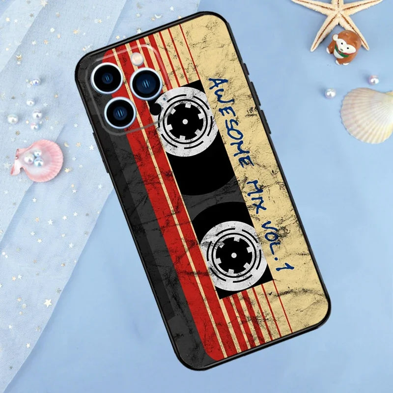 A phone case featuring a vintage cassette tape design with red stripes and black discs on a gold background.