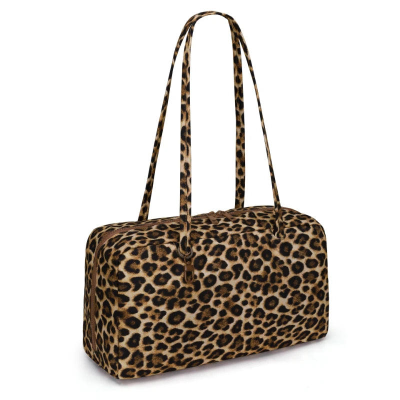 A leopard print nylon shoulder tote bag with long straps.