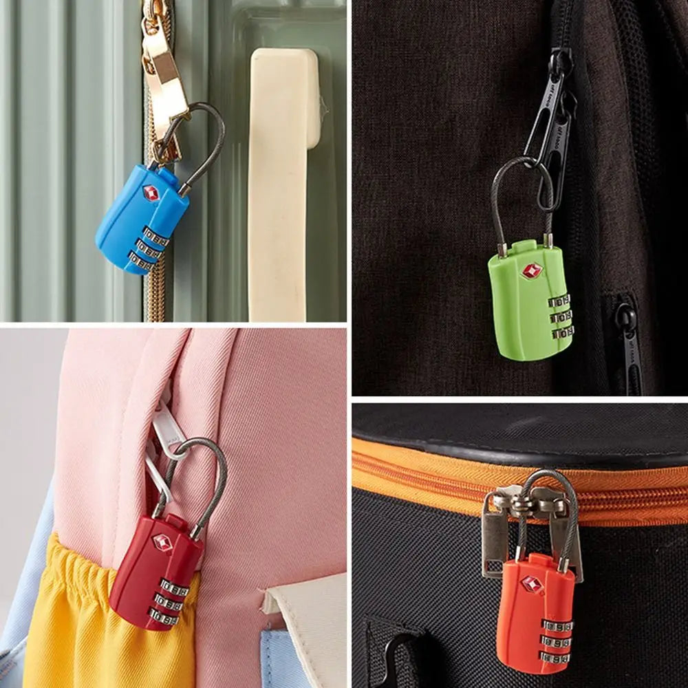 Close-up view of various TSA-approved cable locks in blue, green, and red colors attached to luggage.