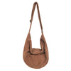 A brown corduroy casual crossbody shoulder bag hanging by its strap.