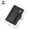 A black slim wallet with a carbon fiber texture and a zippered compartment is shown from above.
