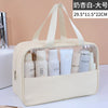 Große, transparente Kosmetik- und Badezusatztasche in Creme mit verschiedenen Flaschen drinnen.