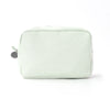 A light green seersucker striped cosmetic bag with a zipper closure.