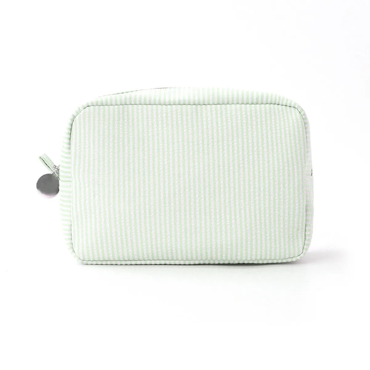 A light green seersucker striped cosmetic bag with a zipper closure.