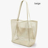 A beige foldable mesh beach tote bag with woven shoulder straps.