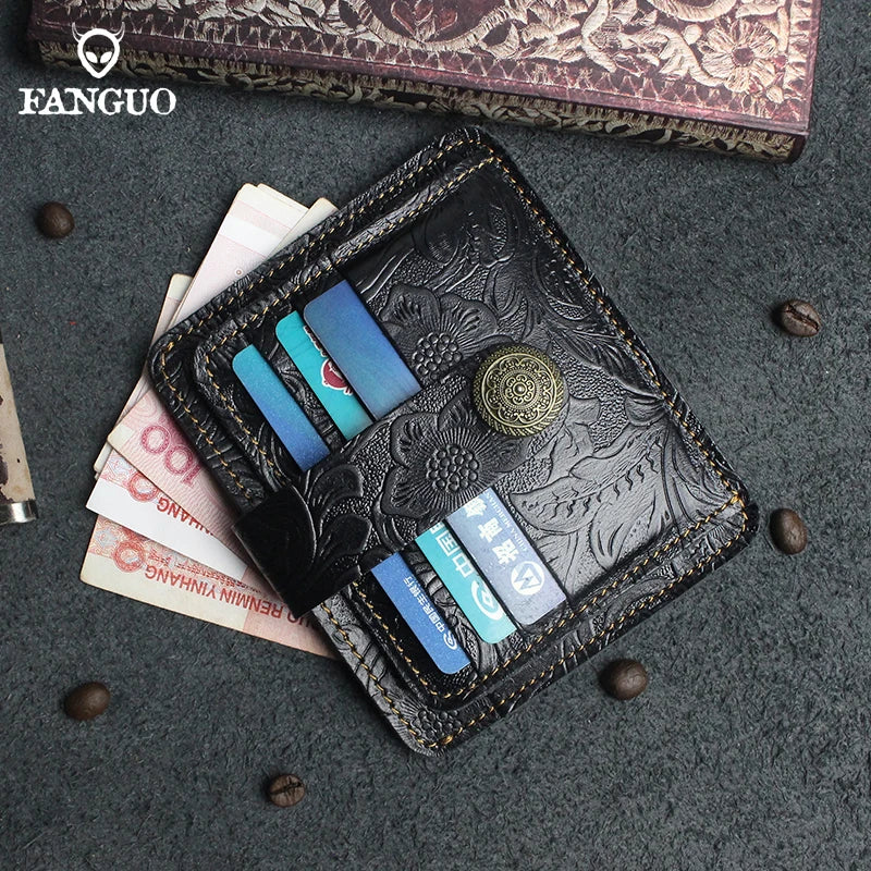 A black genuine leather card wallet with a stitched design and multiple card slots is displayed on a dark gray fabric with sc